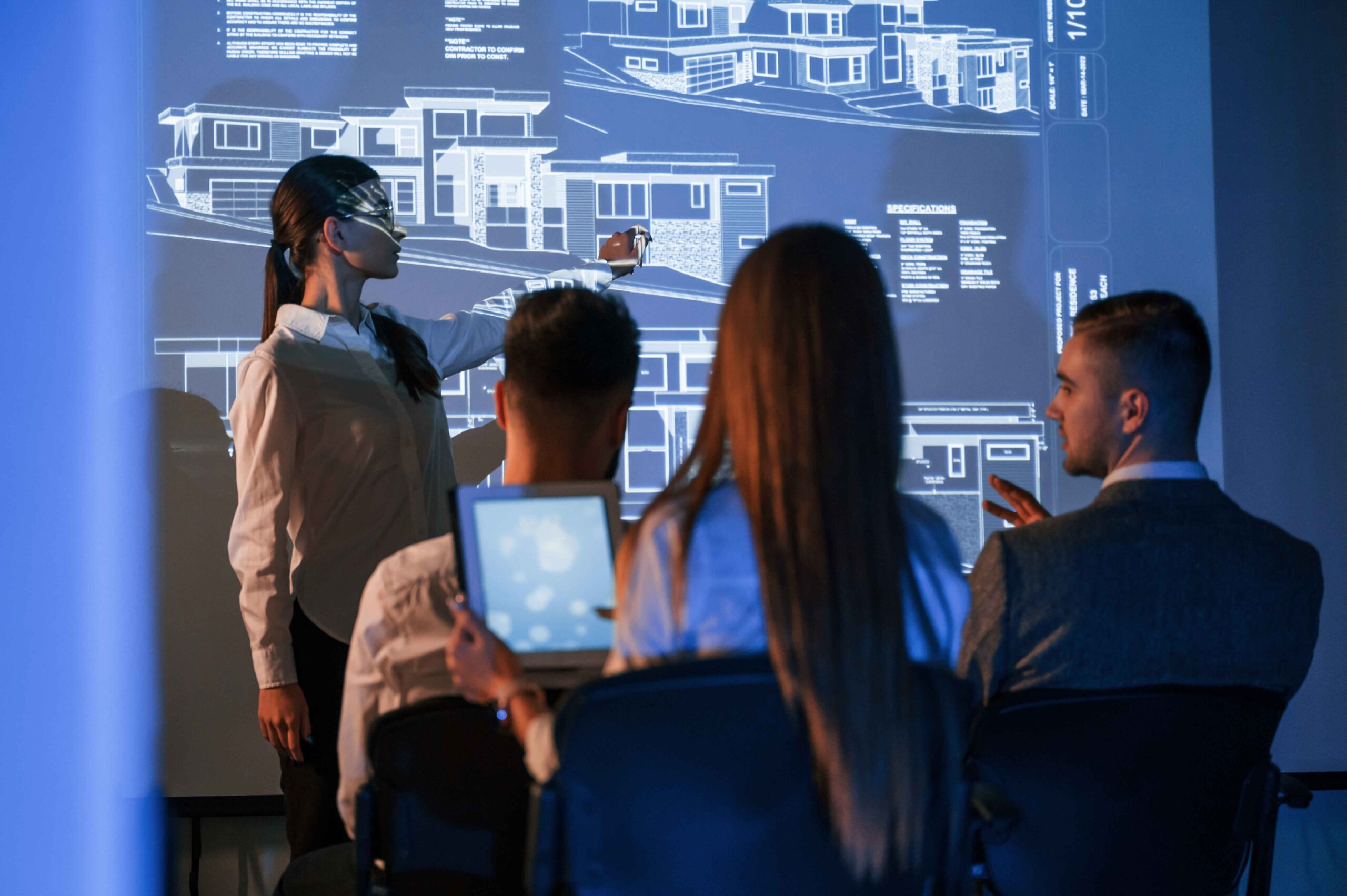 Business meeting at night with architectural design